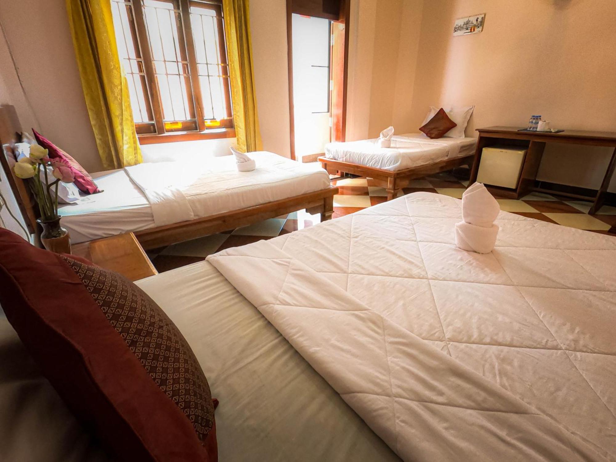 Chambre Triple avec Balcon